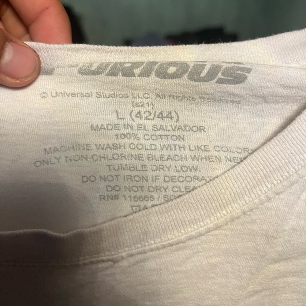 White shirt with cars on it